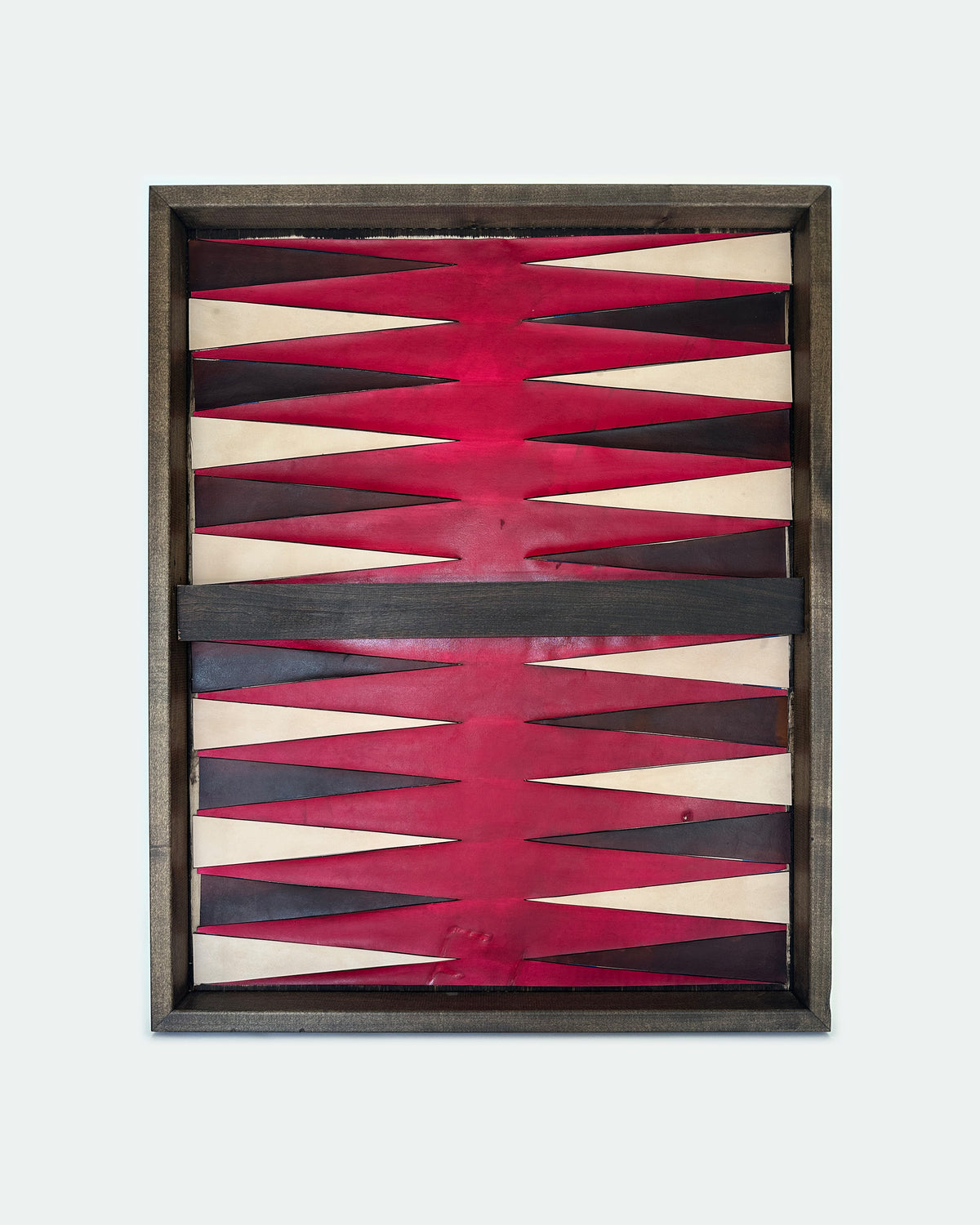 The Homestead 30, a leather backgammon board. Oxblood leather with black and natural points.