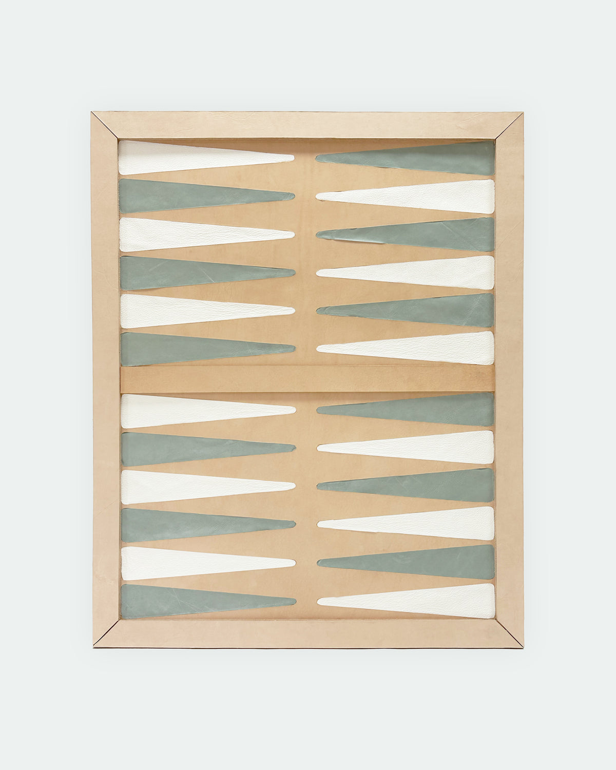 The Homestead 30, a leather backgammon board. Natural leather with baby blue and white points.