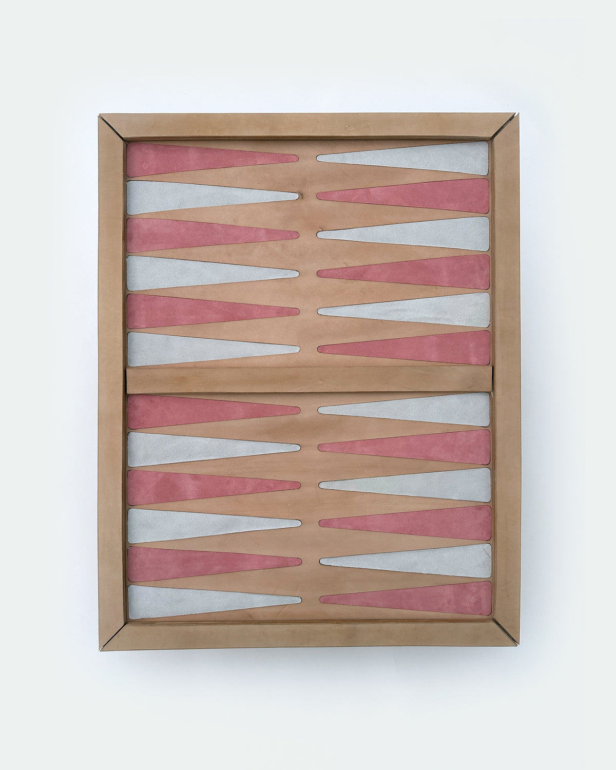 The Homestead 30, a leather backgammon board. Natural leather with cream and pink points.