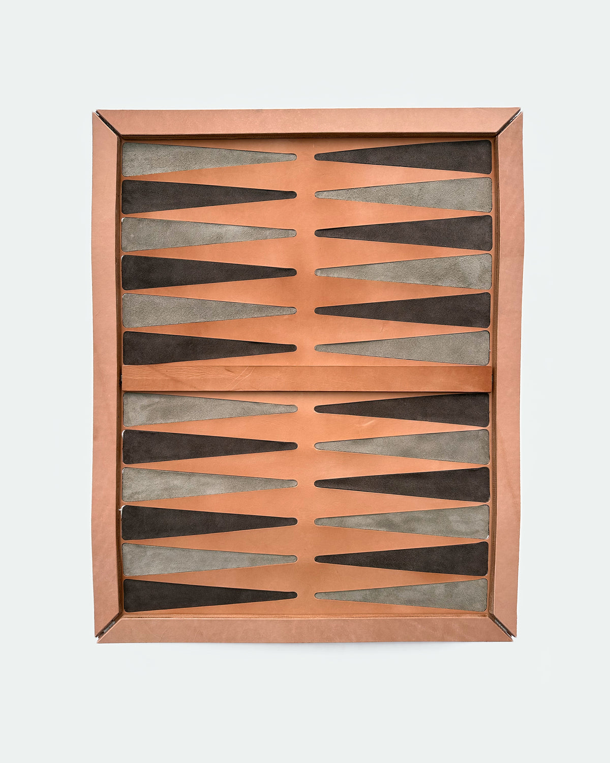 The Homestead 30, a leather backgammon board. Natural leather with chocolate and gray points.