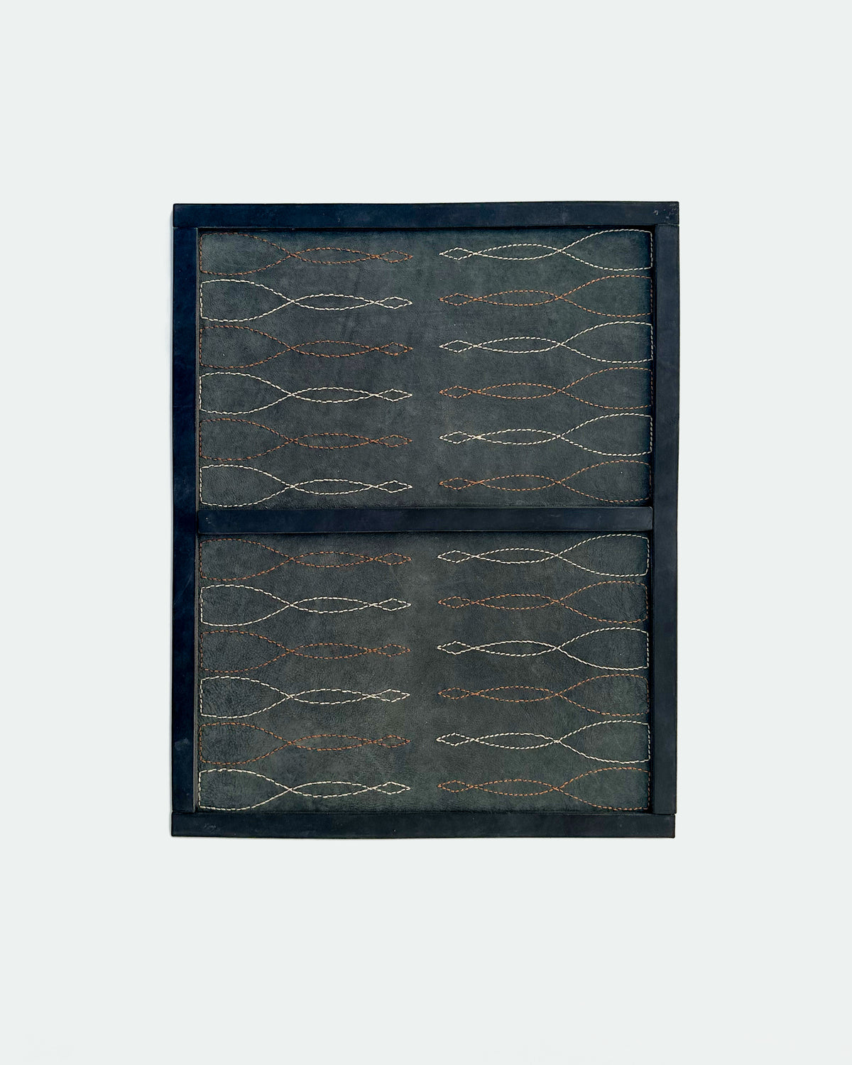 The Drifter 26, a leather backgammon board. USMC black leather with cream and Havana cigar points.
