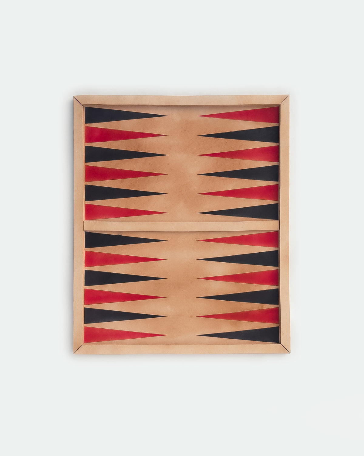 The Homestead 26, a leather backgammon board. Natural leather with black and red points.