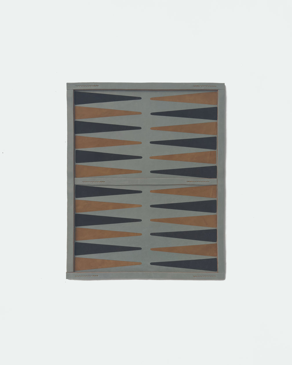 The Drifter 22, a leather backgammon board. Baby blue leather with light brown and USMC black points. View 1.