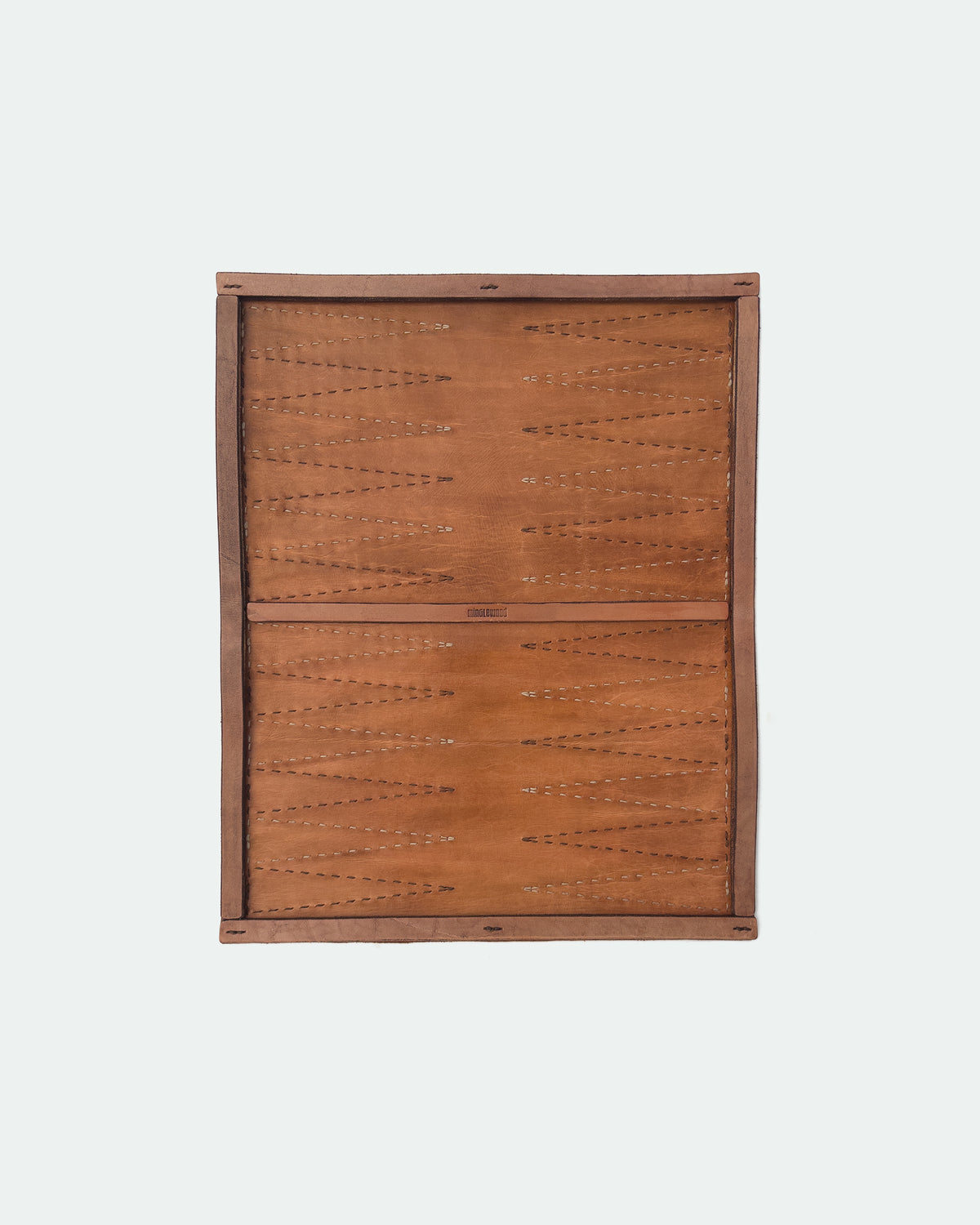 The Drifter 22, a leather backgammon board. Natural leather with beige and Havana cigar points.