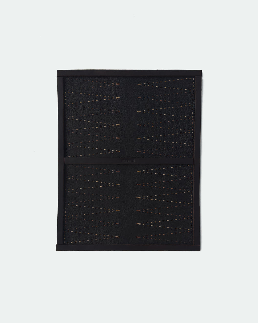 The Drifter 22, a leather backgammon board. Dark brown leather with light brown and medium brown points. View 1.