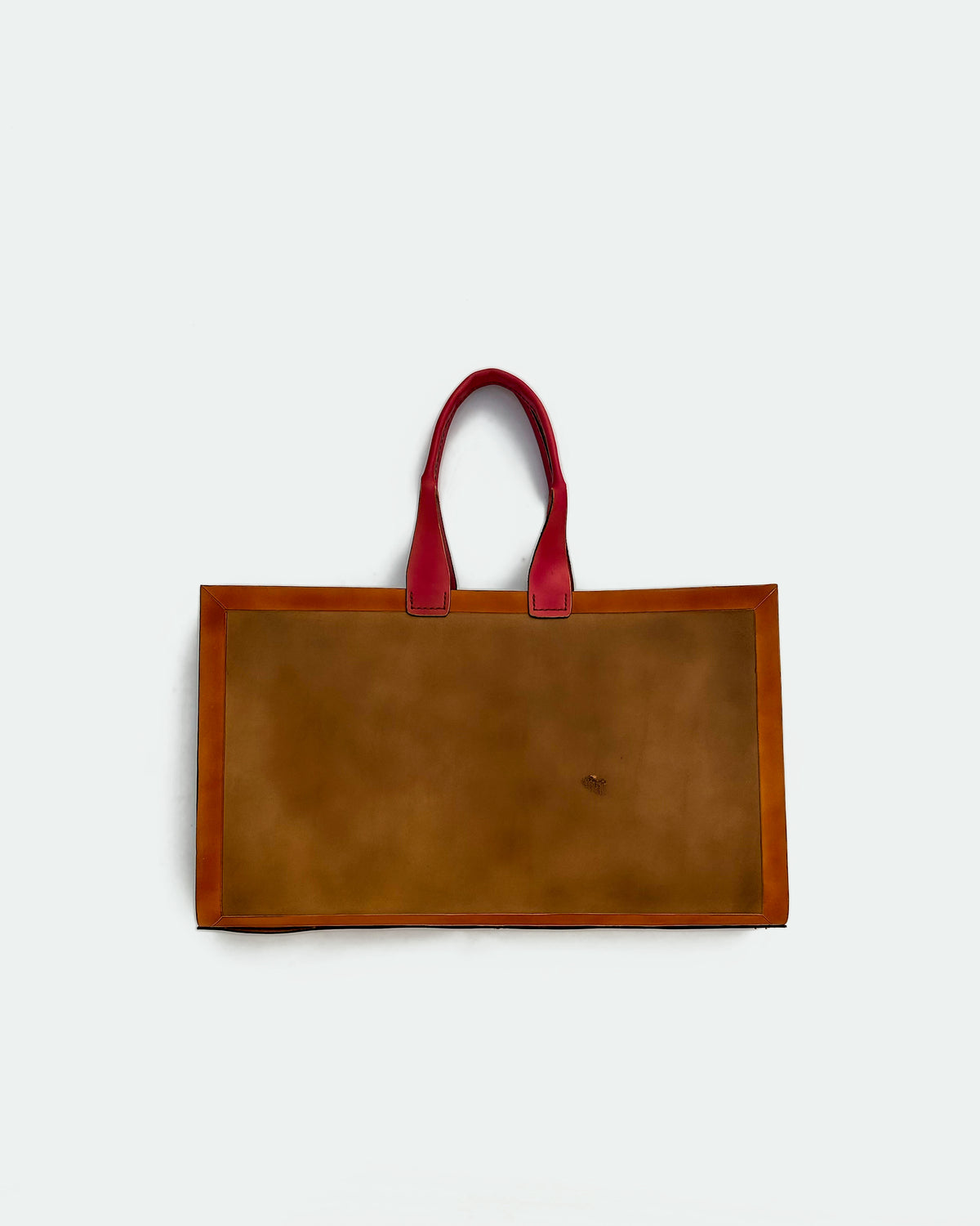 The Drover 26, a leather backgammon board. Medium brown leather with oxblood and show brown points. View 2.