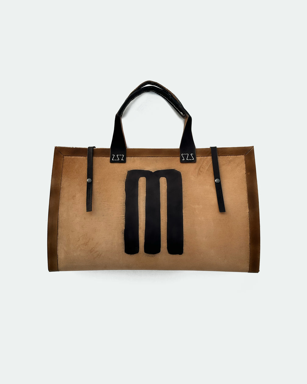 The Drover 26, a leather backgammon board. Show brown leather with black and natural points. View 2.