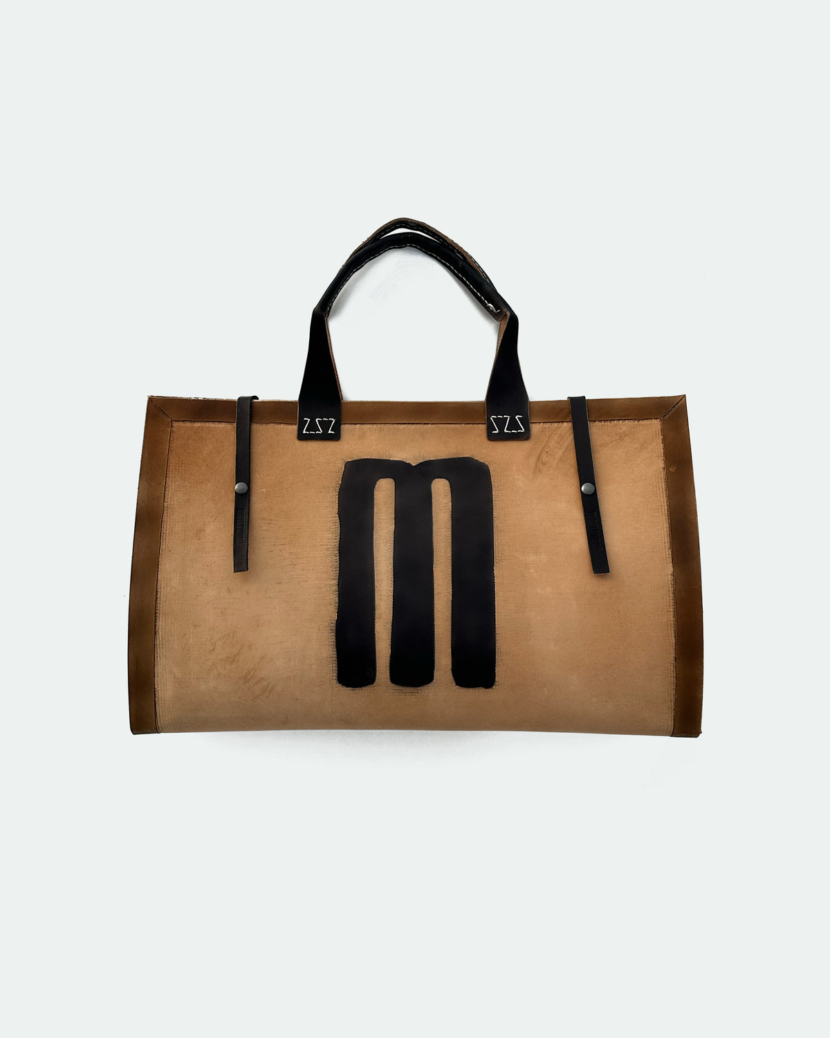 The Drover 26, a leather backgammon board. Show brown leather with black and natural points. View 2.