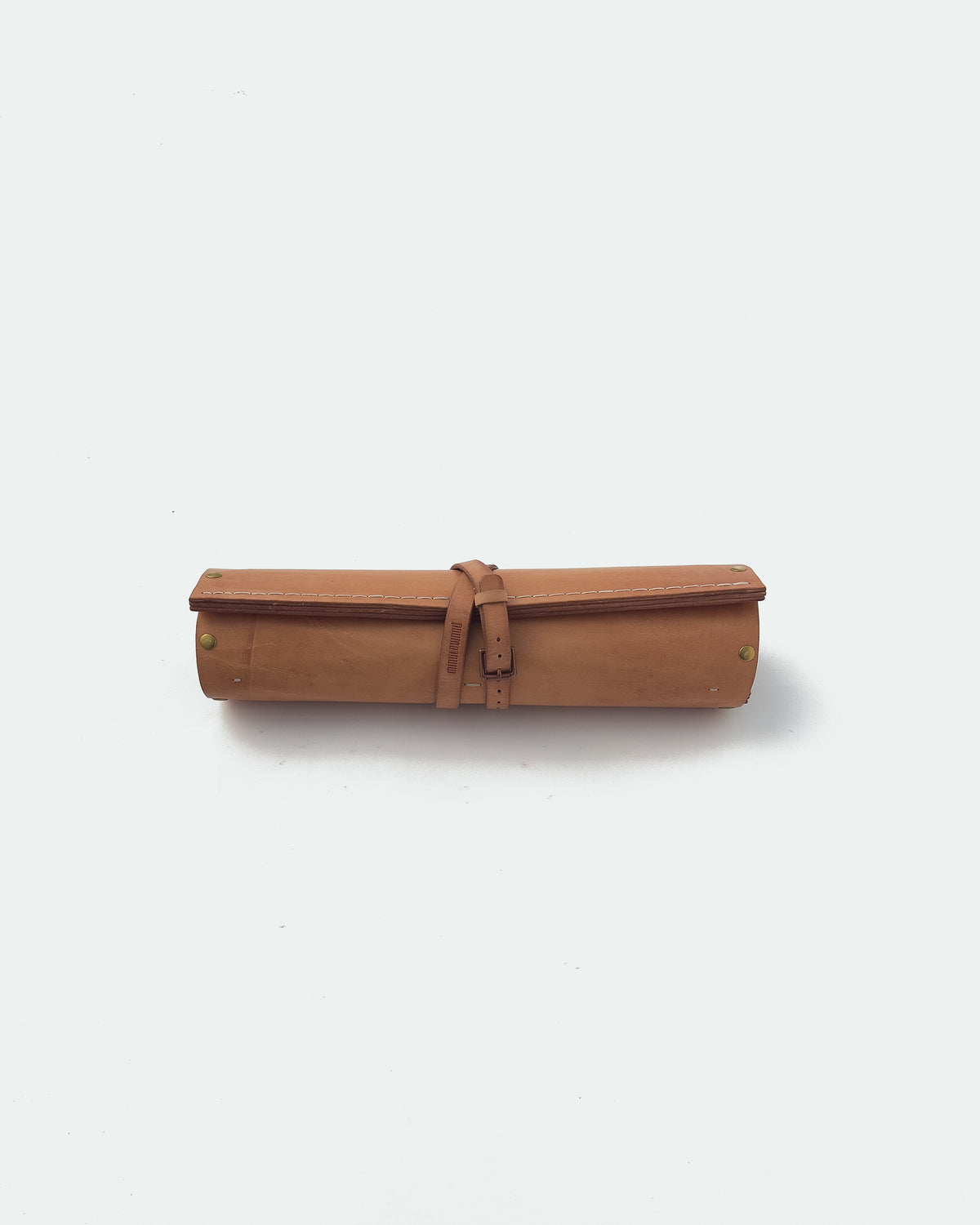 The Drifter 22, a leather backgammon board. Natural leather with turquoise antique and white antique points. View 2.
