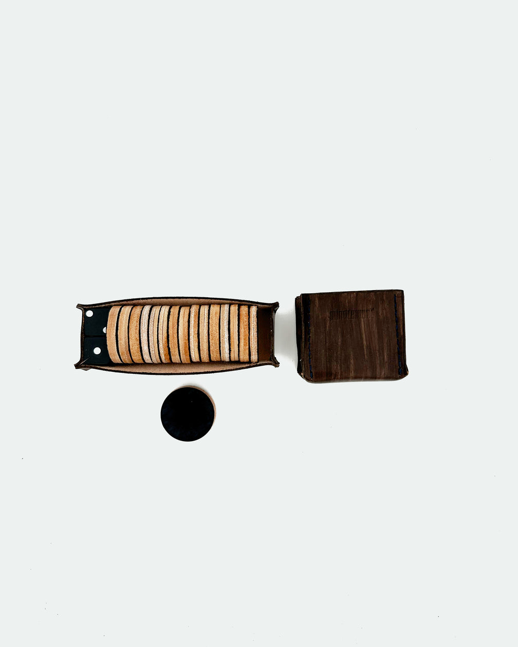 The Homestead 30, a leather backgammon board. Chocolate leather with black and natural points. View 3.
