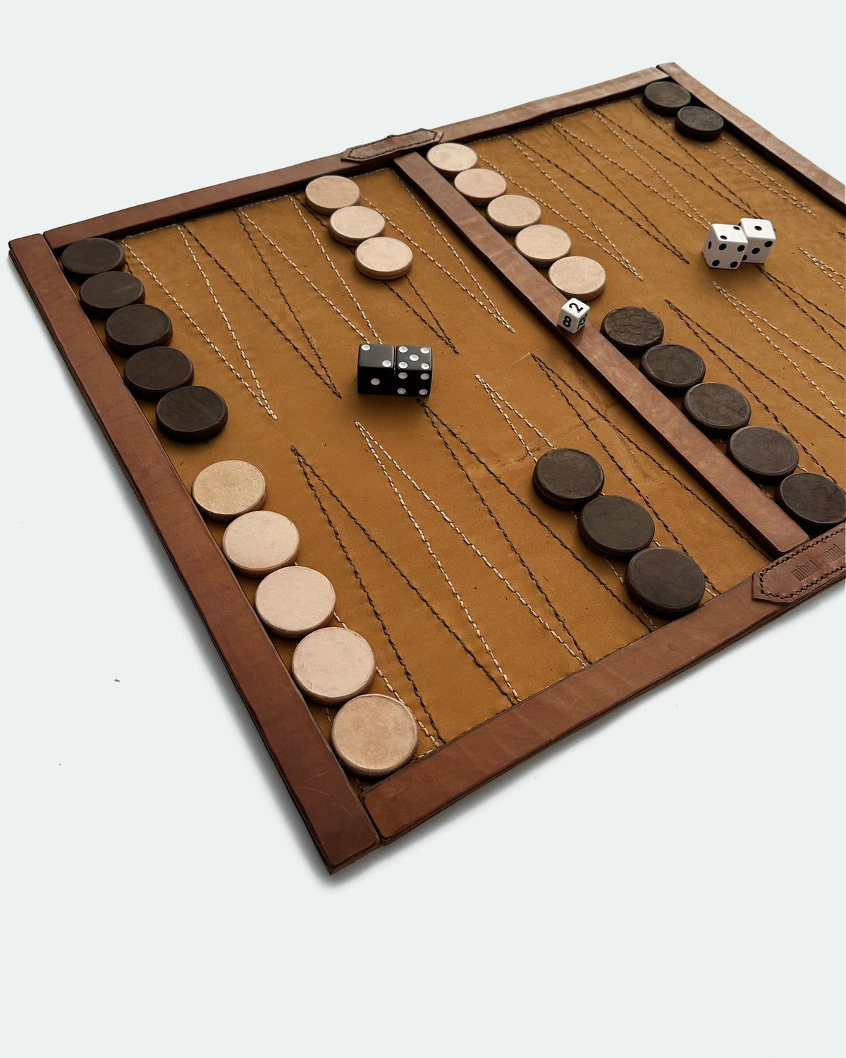 The Drifter 26, a leather backgammon board. Burnt orange leather with cream and dark brown points. View 3.