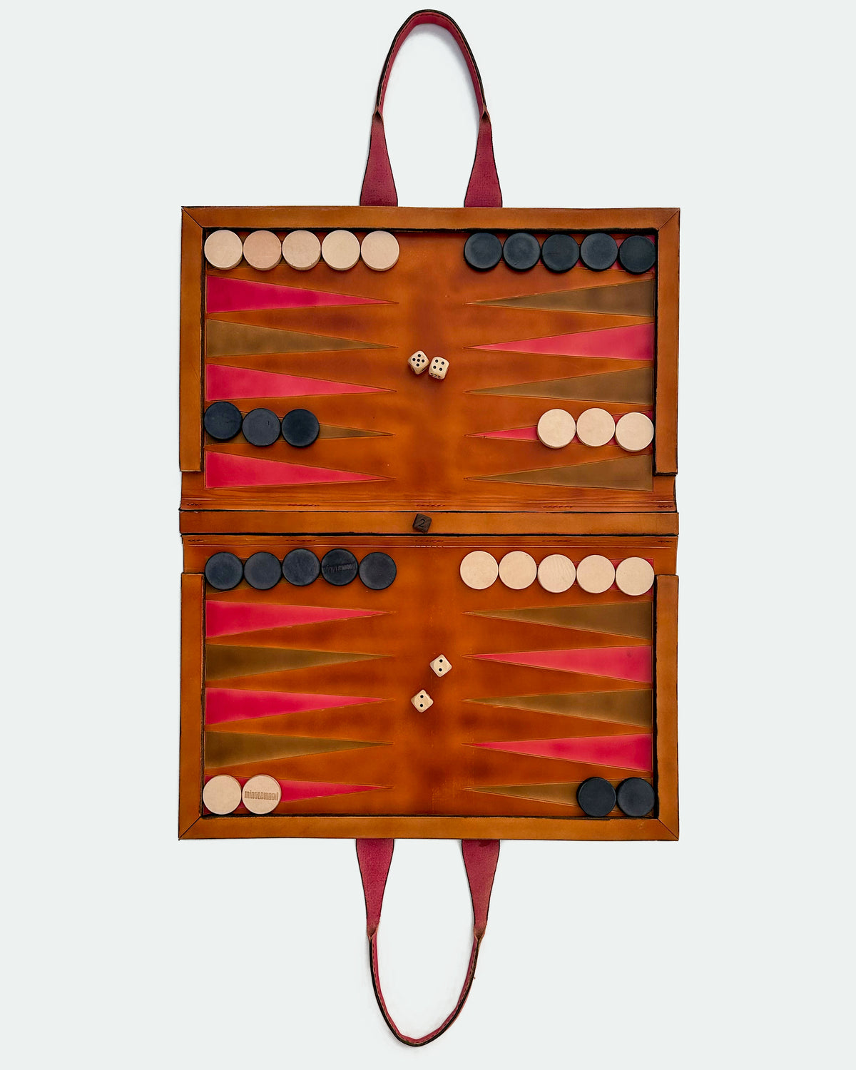 The Drover 26, a leather backgammon board. Medium brown leather with oxblood and show brown points. View 3.
