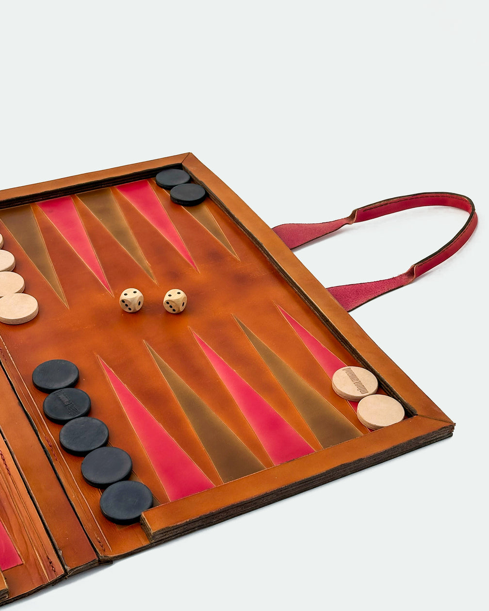 The Drover 26, a leather backgammon board. Medium brown leather with oxblood and show brown points. View 4.