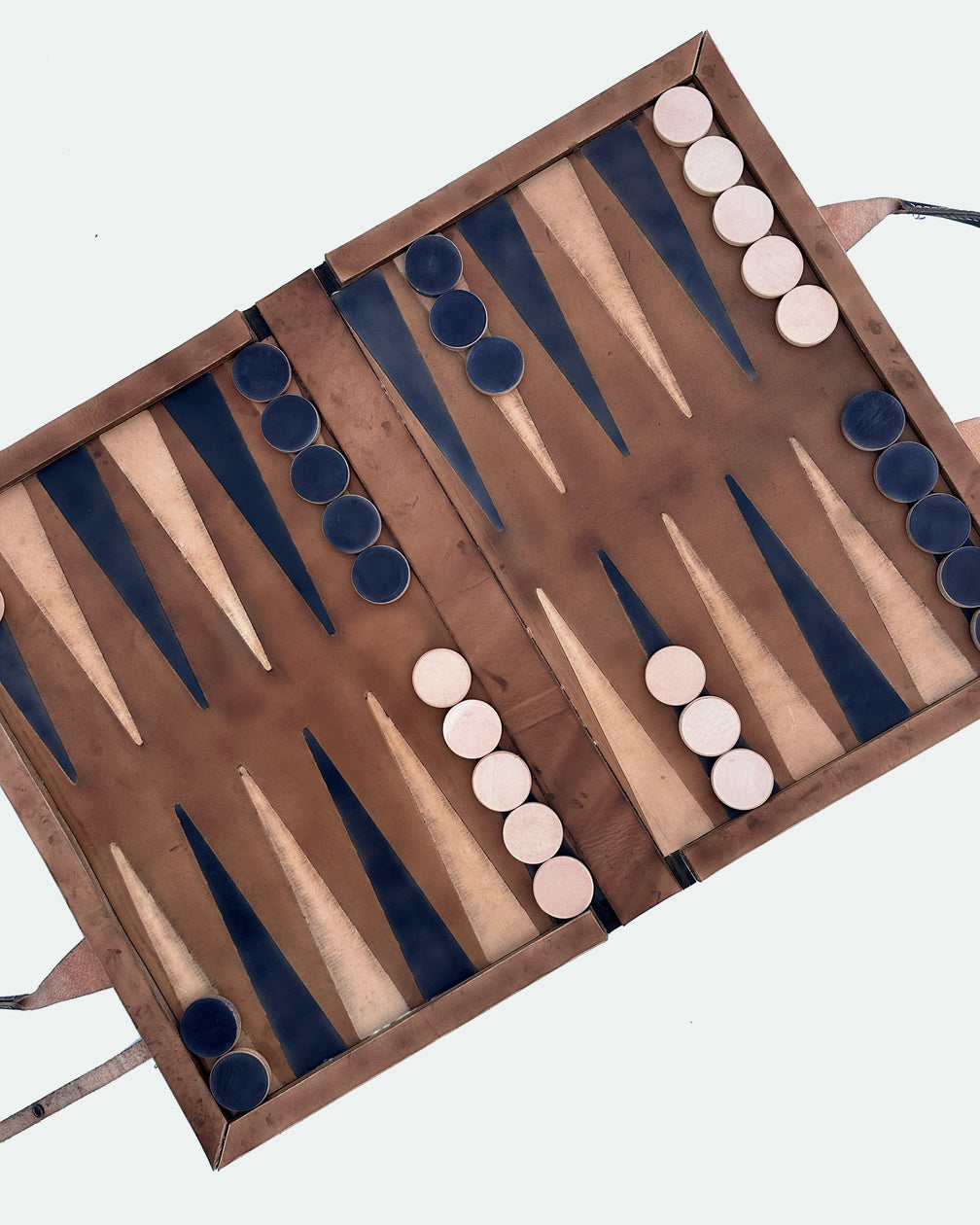The Drover 26, a leather backgammon board. Show brown leather with black and natural points. View 4.