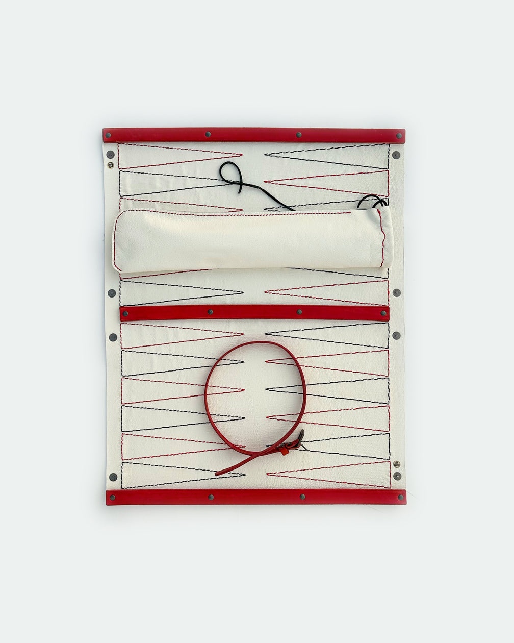 The Drifter 26, a leather backgammon board. White leather with black and red points. View 5.