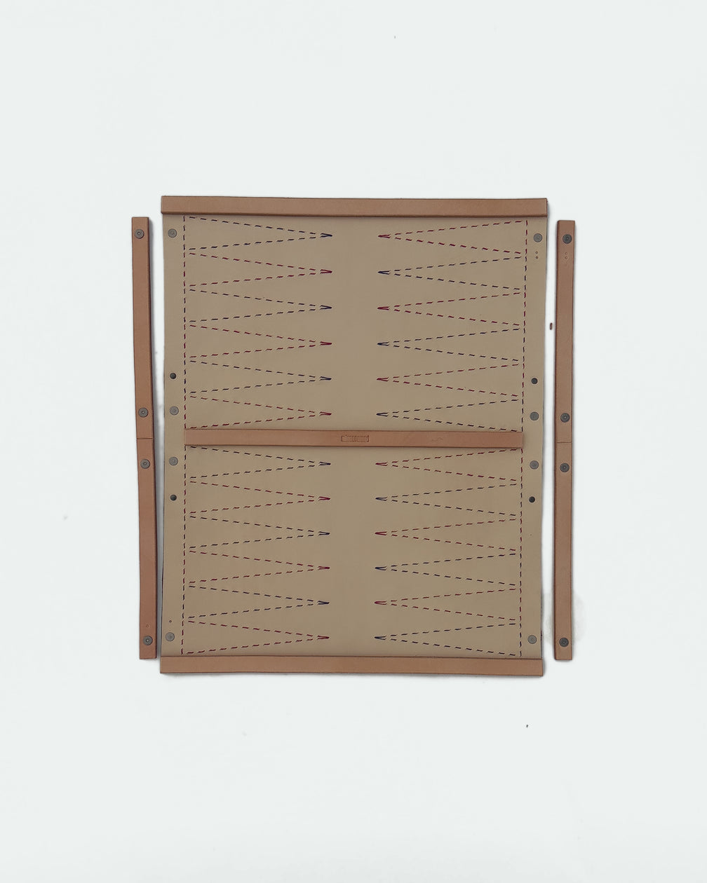 The Drifter 22, a leather backgammon board. Natural leather with dark pink and navy points. View 5.