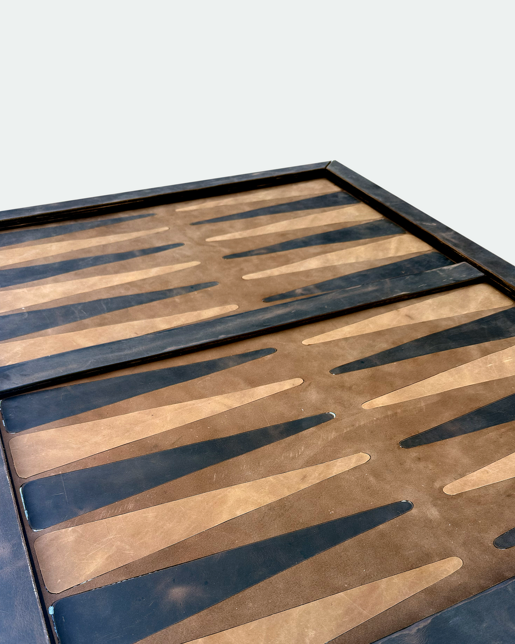 Brown inlaid backgammon board, angled view