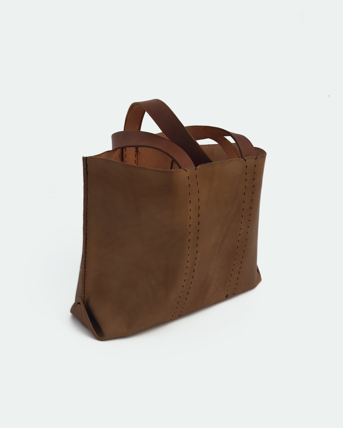 The Tote — Show Brown, Black & Dark Brown, three-quarter view