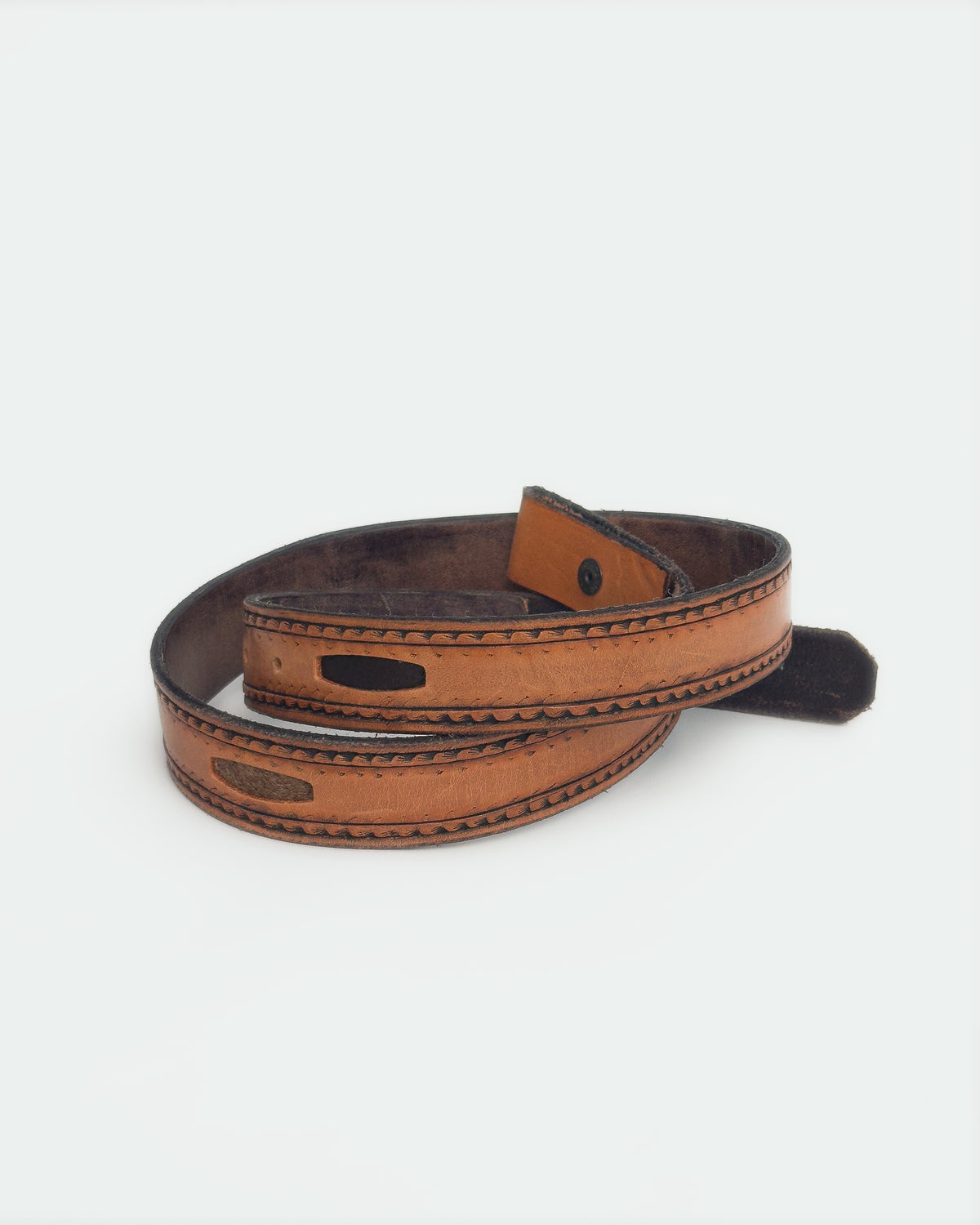The Belt — Natural & Black Antique, front